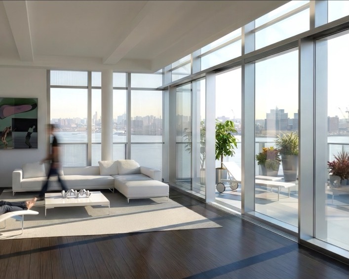 166 Perry Street living room with floor-to-ceiling glass and panoramic Hudson River views