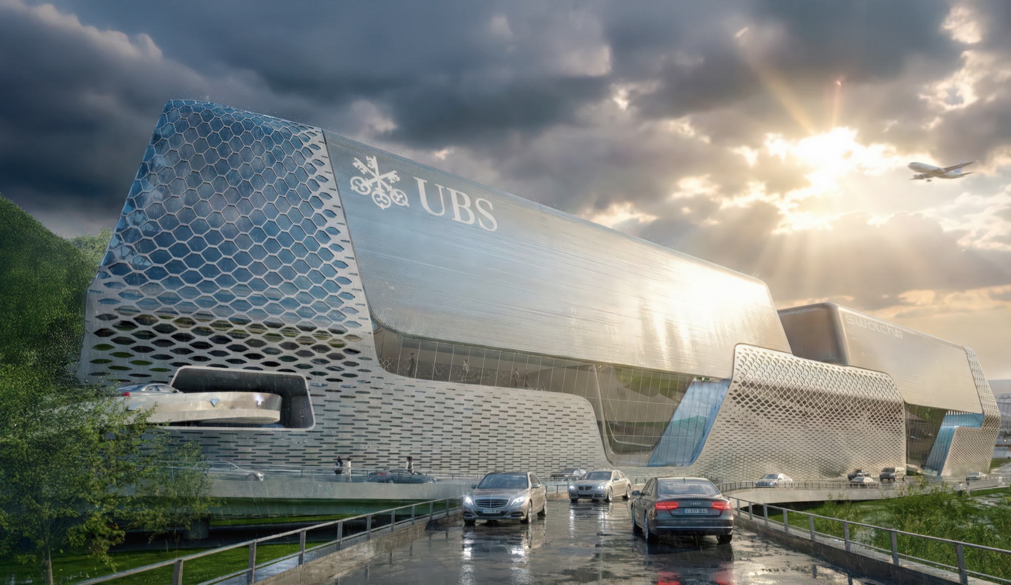 Dramatic angle of the UBS-branded wing with honeycomb cladding, aircraft overhead, and sunlit metallic volumes
