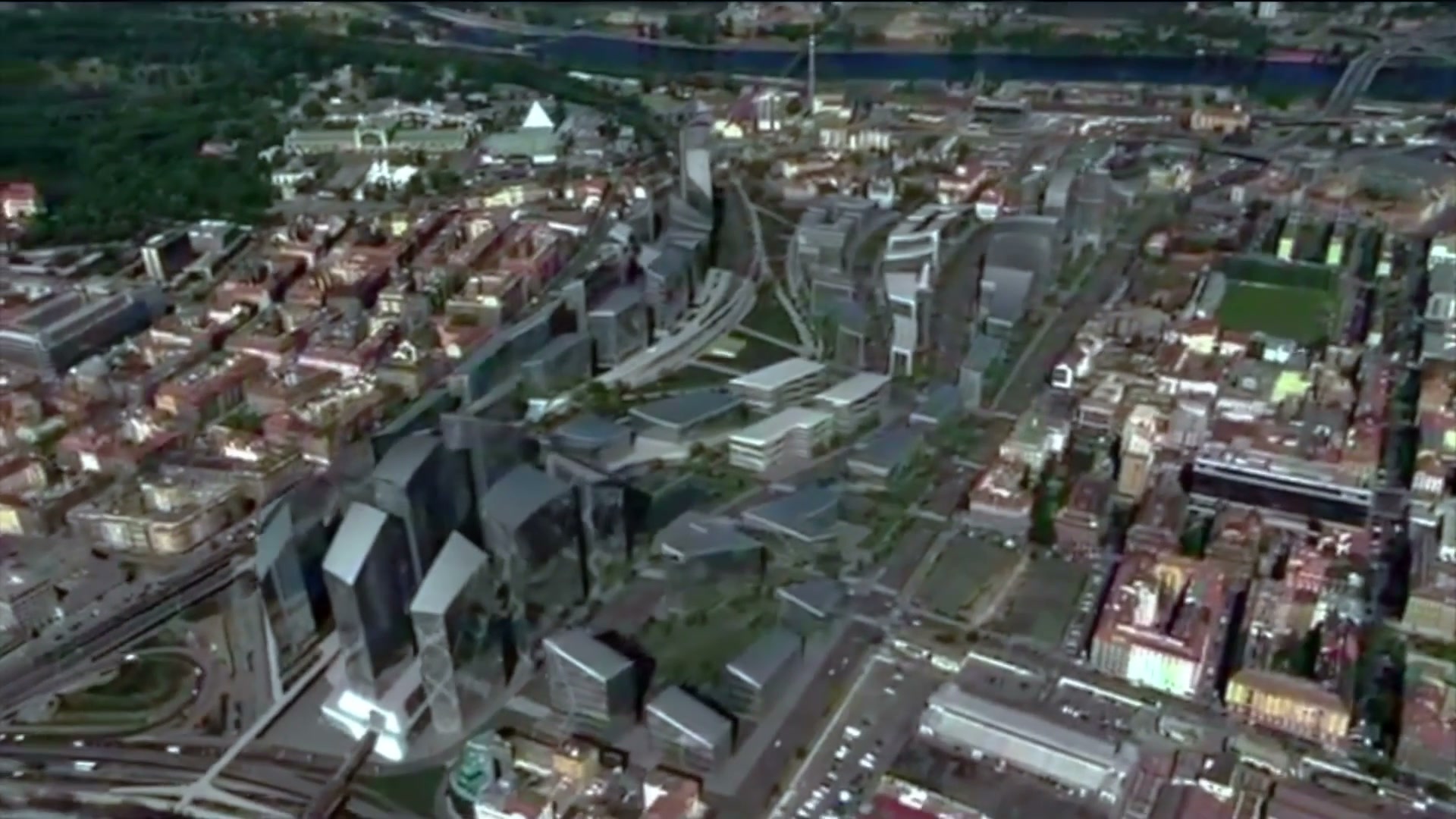 Aerial view of the Bubny City Center masterplan integrated into Prague's urban fabric with the Vltava River beyond