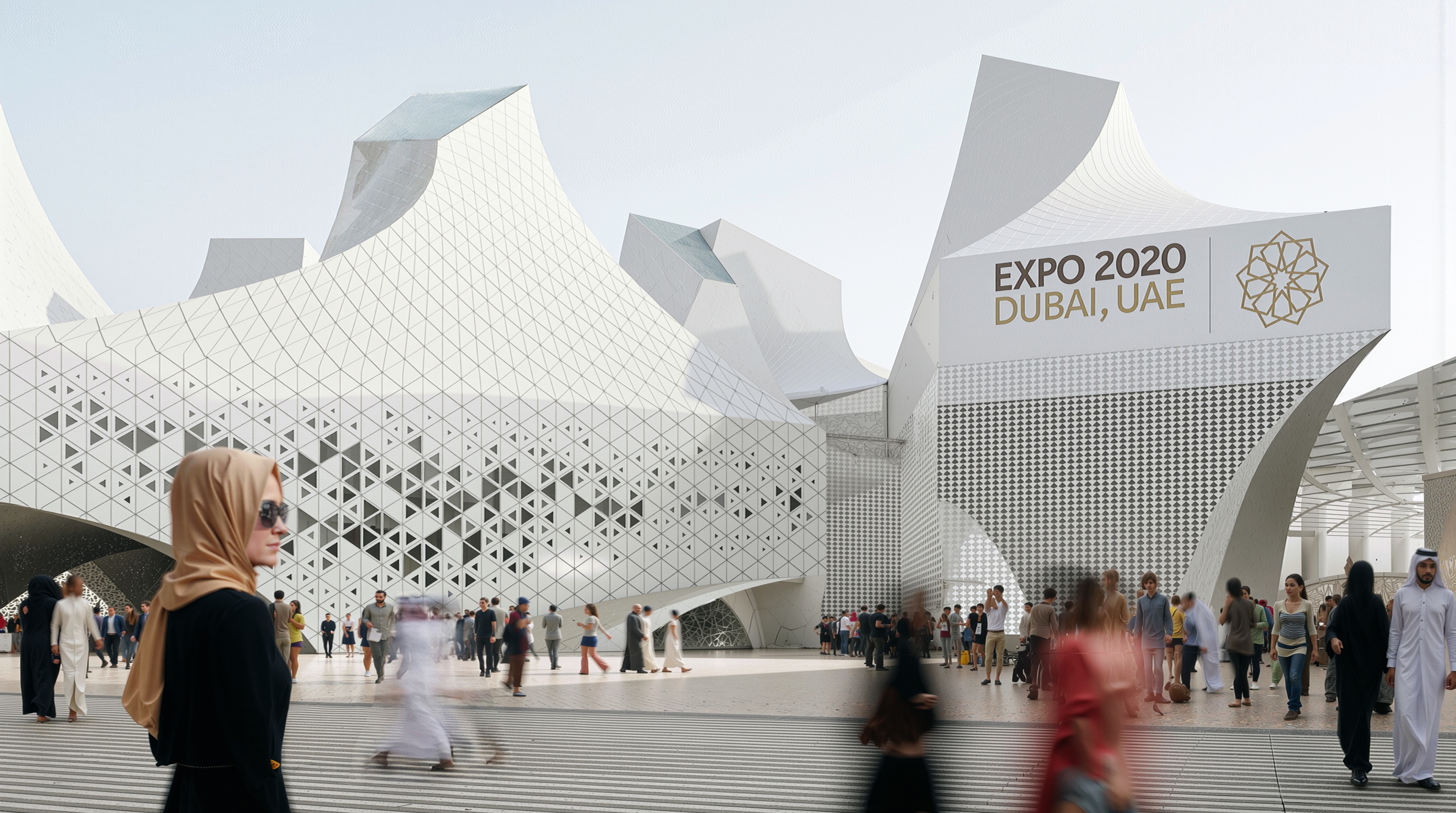 Daytime view of the pavilion entrance plaza with the Expo 2020 Dubai signage and visitors approaching the angular facade