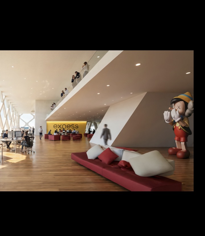 Exness Headquarters open workspace with lounge seating and double-height diamond structure