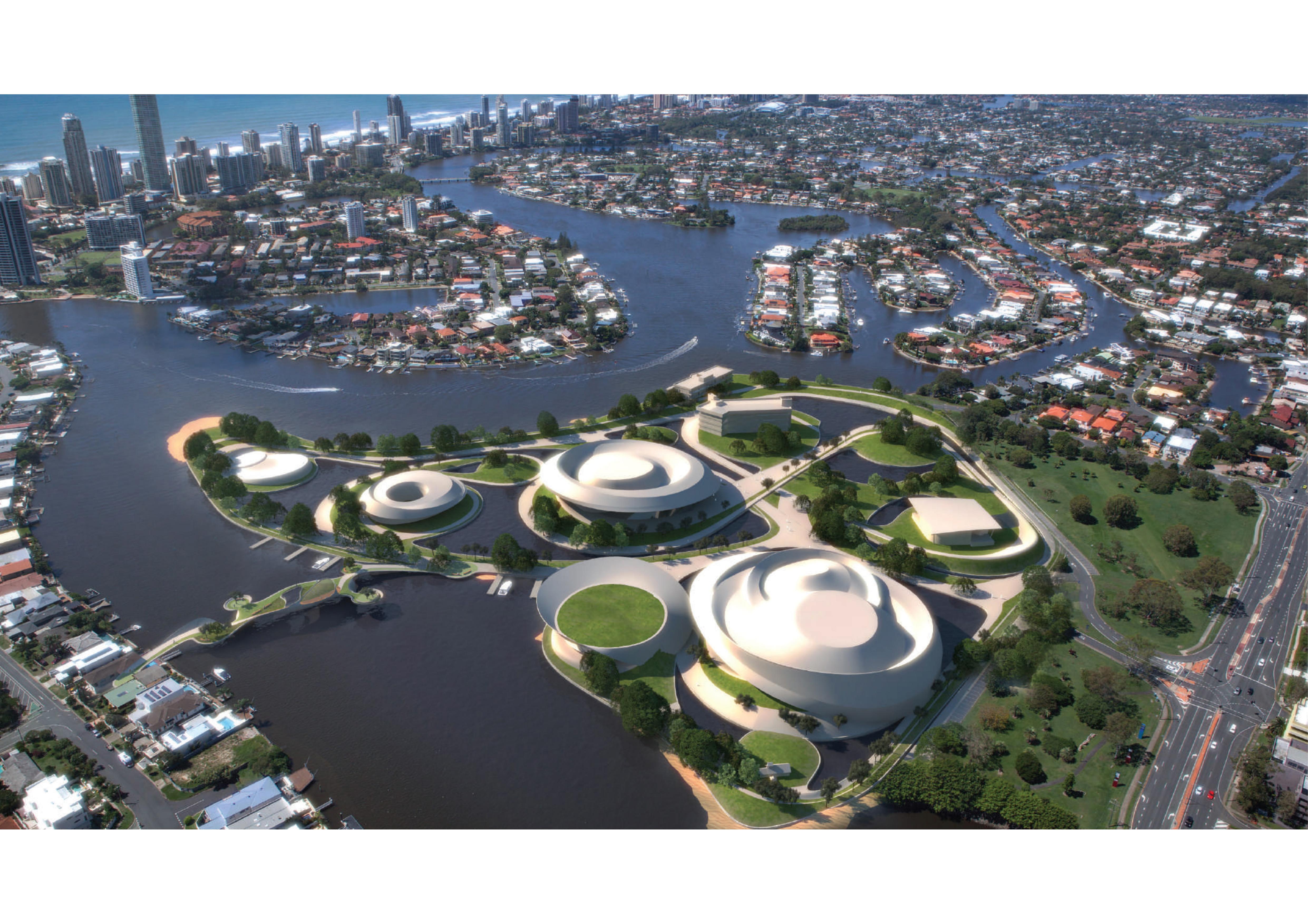 Aerial view of the Gold Coast Culture Park with sculpted green landforms, performing arts venues, and waterfront promenades set within the Nerang River