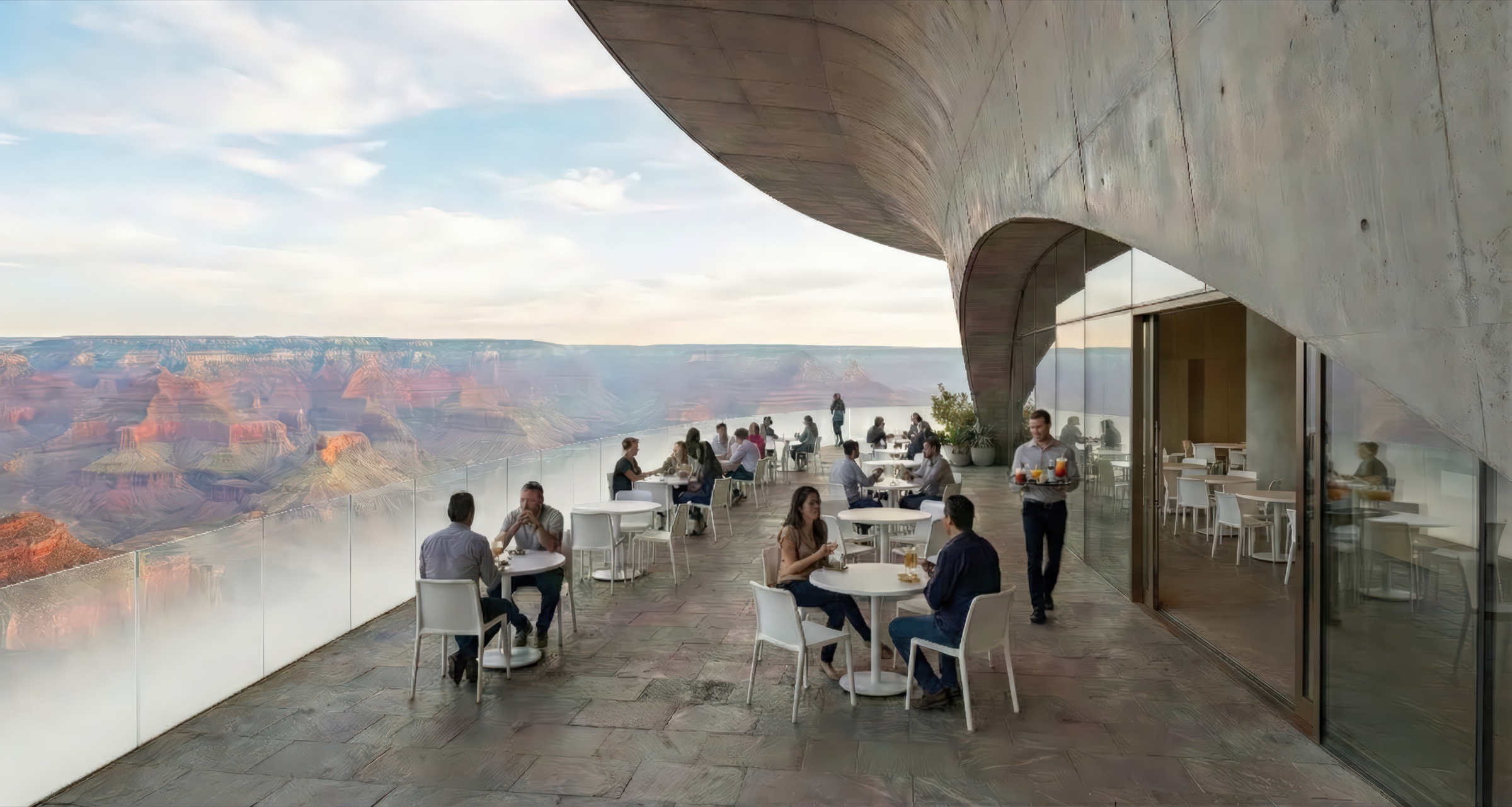 Outdoor terrace café beneath a sweeping concrete canopy with diners at white tables, a waiter, and a dramatic panoramic view of the Barranca canyon in warm light