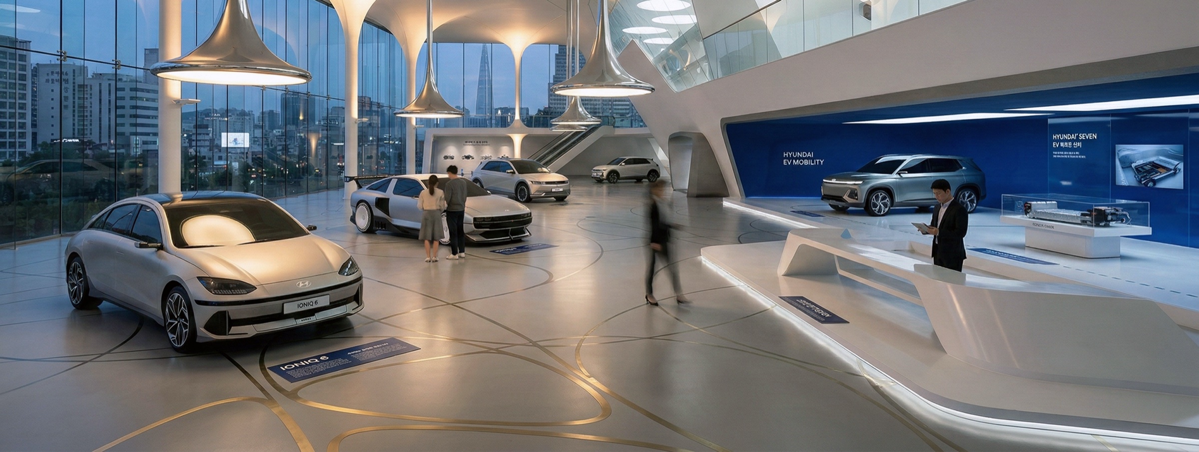 Panoramic interior view of the main showroom floor featuring IONIQ electric vehicles, sculptural trumpet-shaped pendant columns, and blue digital display walls with Seoul cityscape visible through floor-to-ceiling glazing