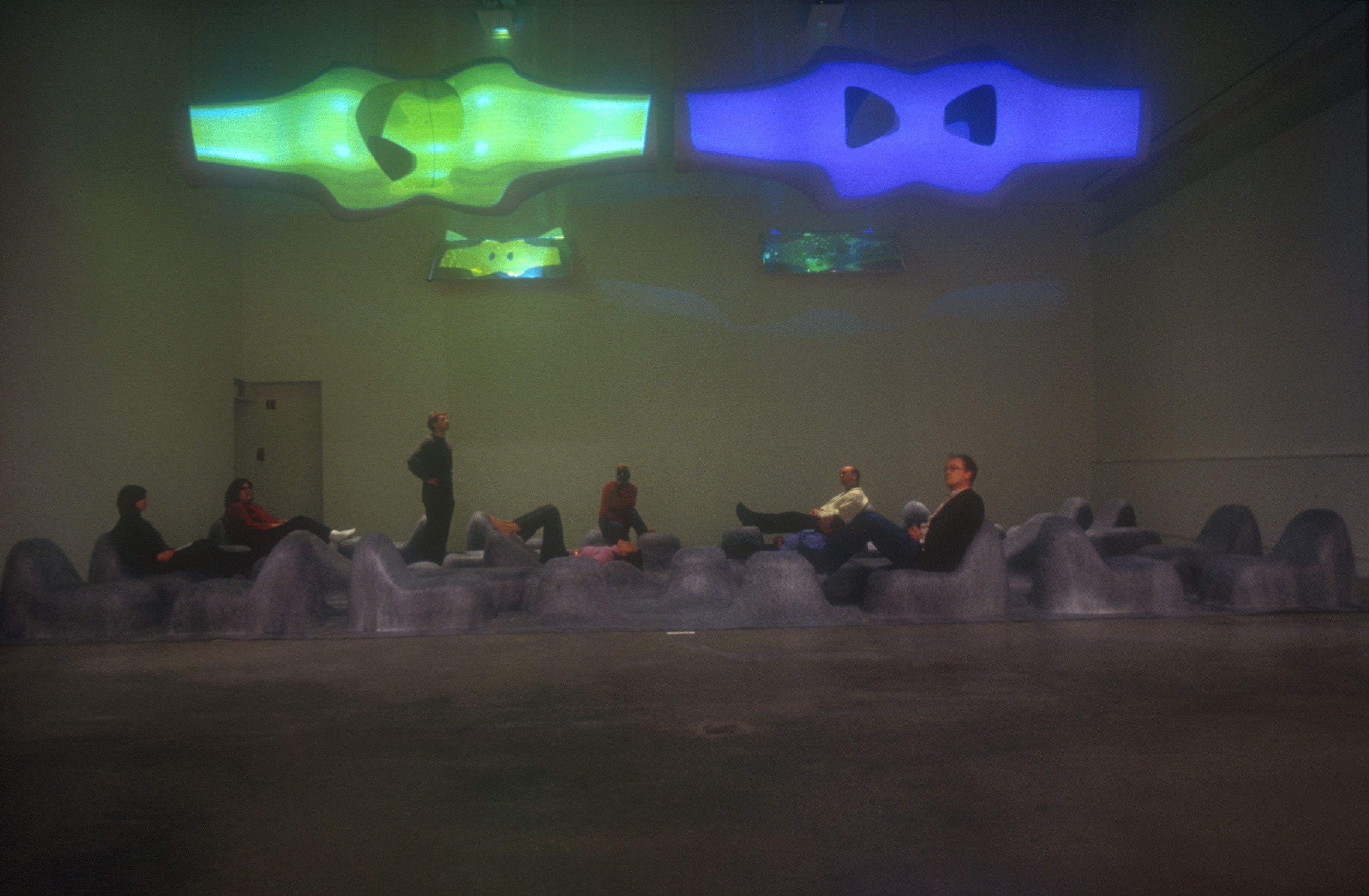 Stratascape installation at ICA Philadelphia — biomorphic M-Scape forms glowing green and blue above sculptural felt landscape