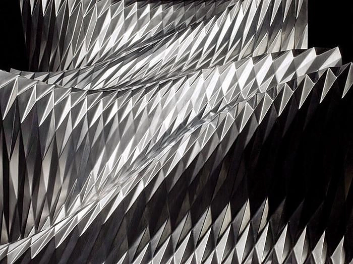 The Ivo_03 table by Asymptote for Meta — full view showing the slumped glass top and sculpted steel base