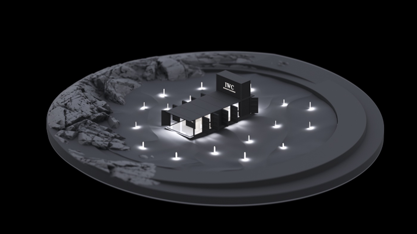 IWC Woodland world at night with illuminated booth