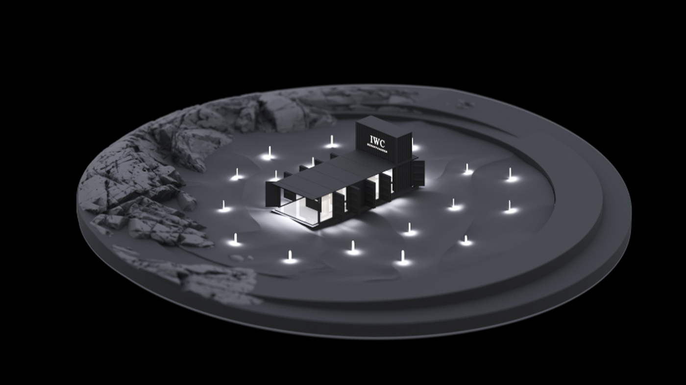 IWC Woodland world at night with illuminated booth