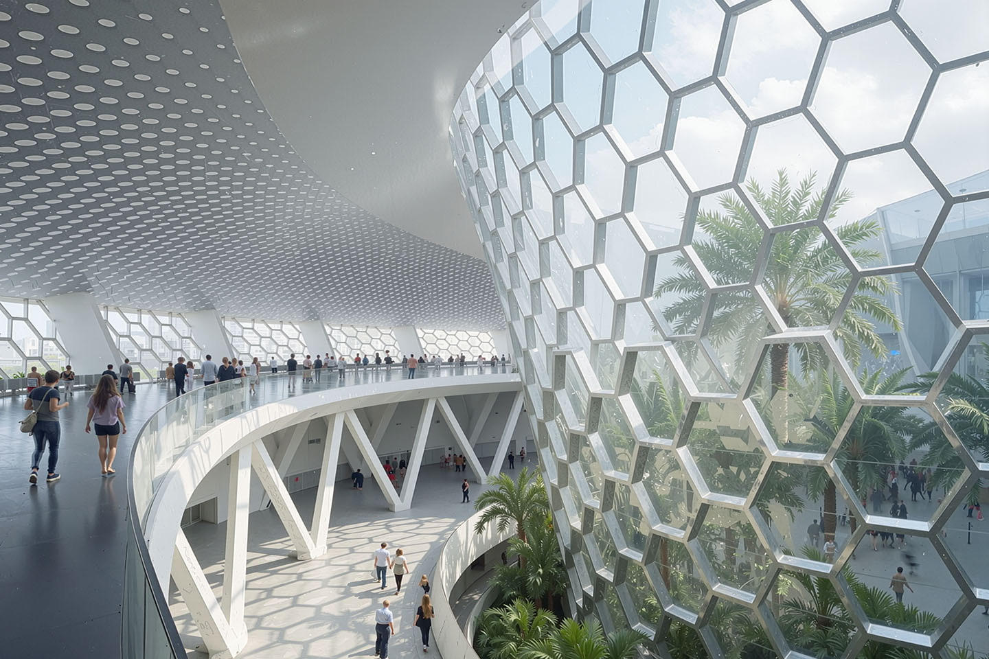 Interior of the grand atrium with the massive honeycomb glazing wall curving upward, palm trees visible through the glass, an elevated curved walkway, and perforated ceiling above