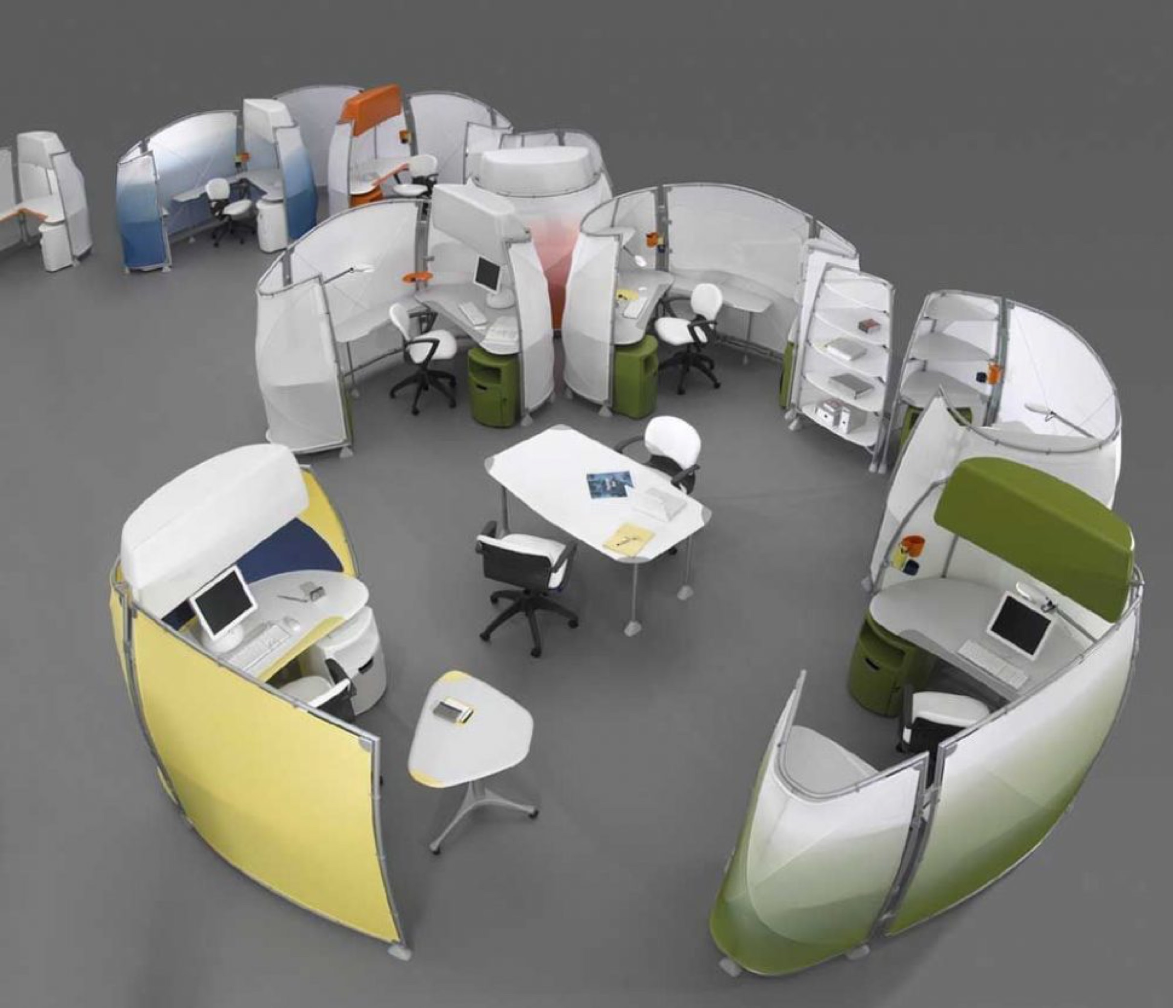 Aerial view of multiple A3 workstations arranged in a circular cluster configuration with colorful translucent screens in blue, green, yellow, and orange