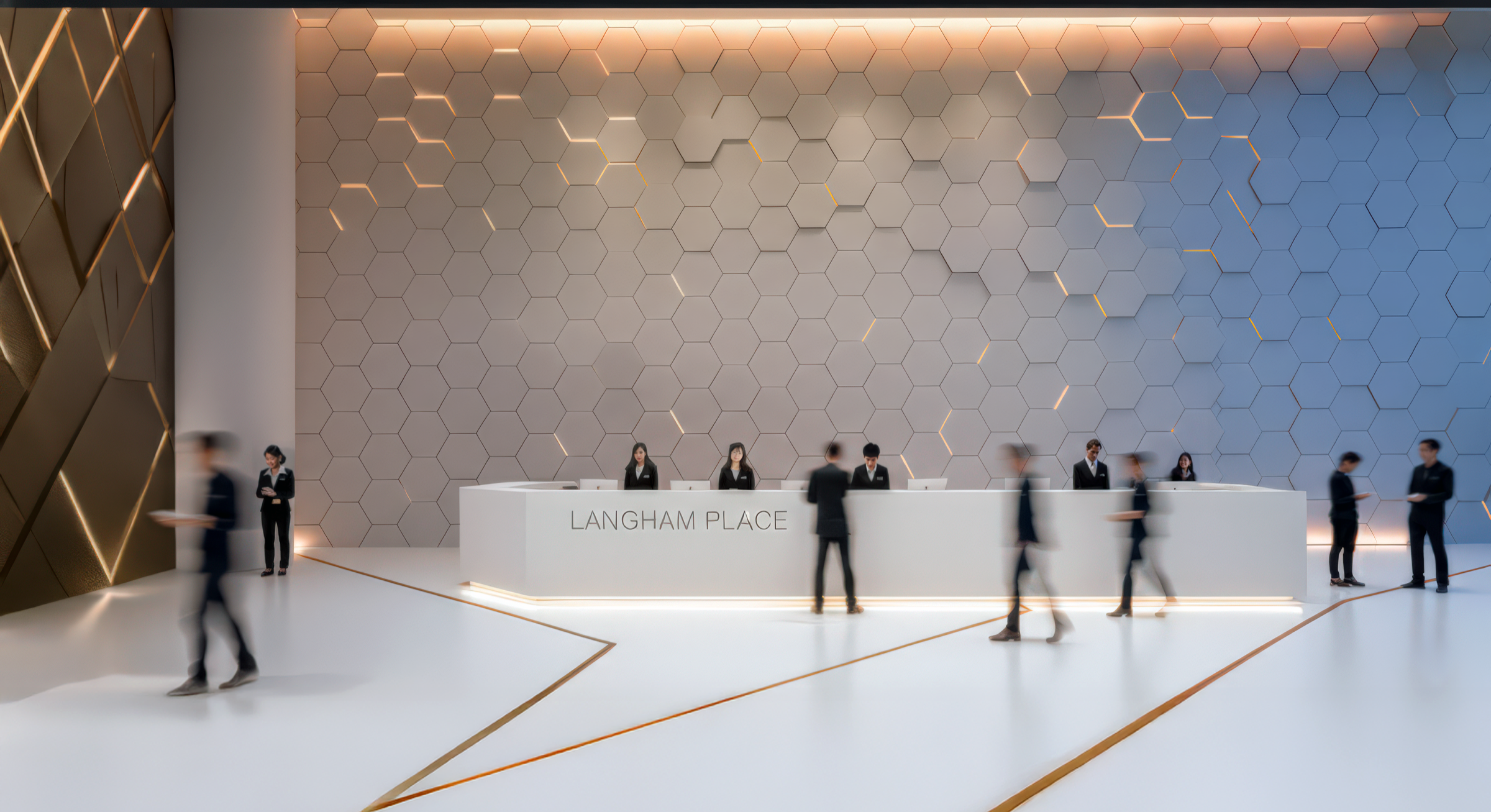 Langham Place reception from a wider angle showing the full hexagonal feature wall, LANGHAM PLACE signage on the white desk, gold diamond-pattern wall detail at left, and guests in the lobby