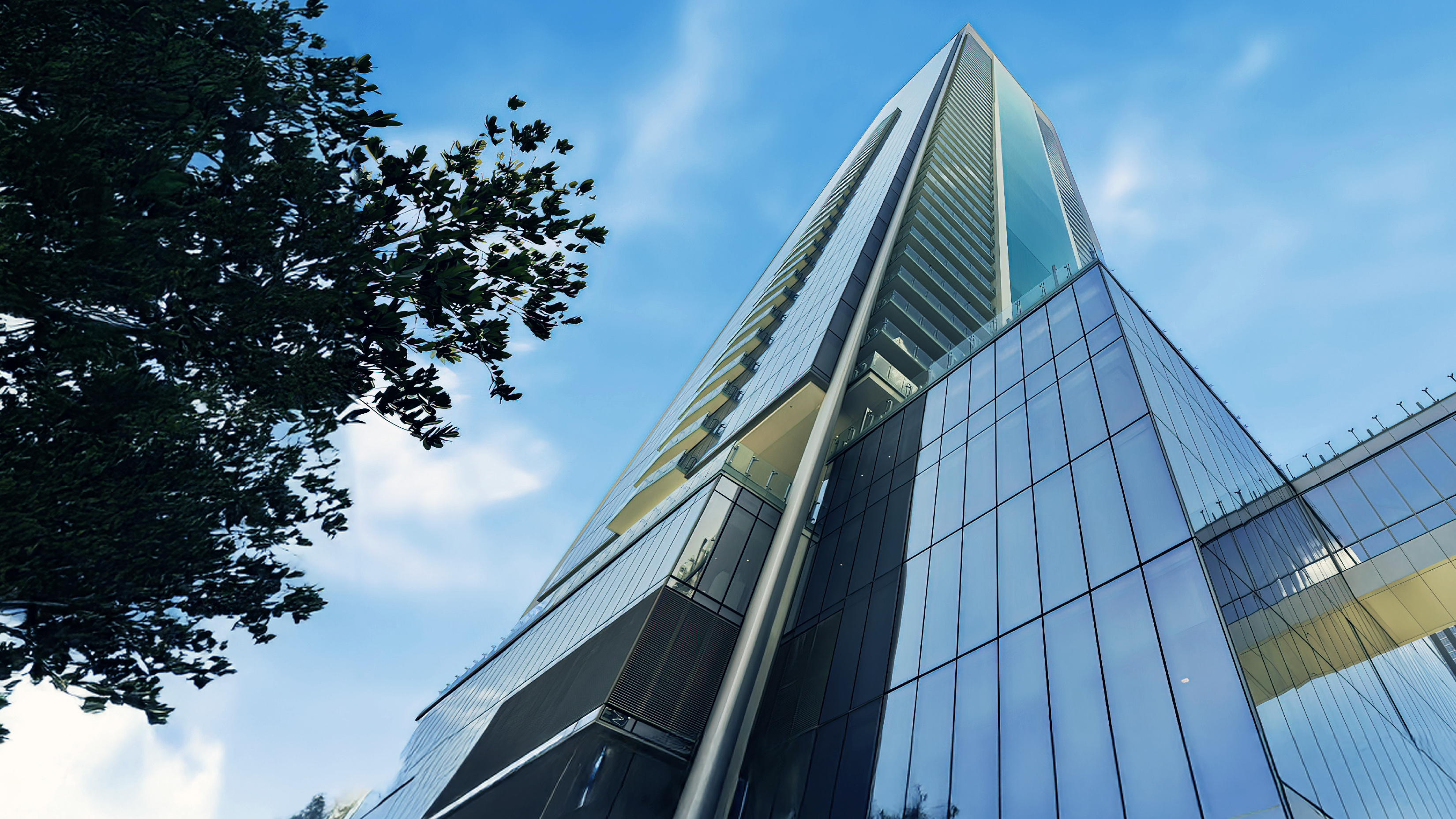 Dramatic low-angle view of the Missoni Baia tower rising against the sky with its sleek glass curtain wall