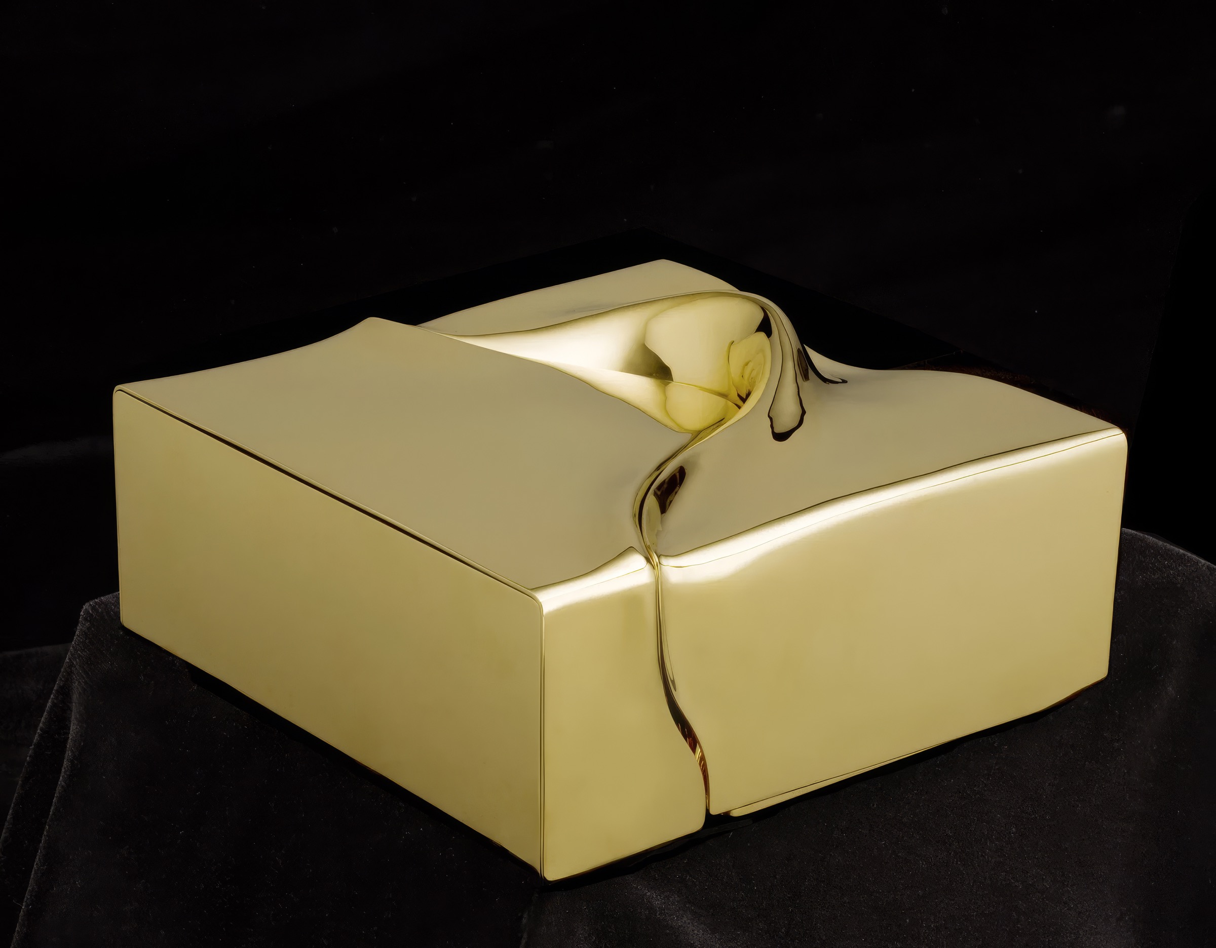Mnemos 02 — square gold vermeil box with a molten droplet erupting from the lid surface, on black velvet