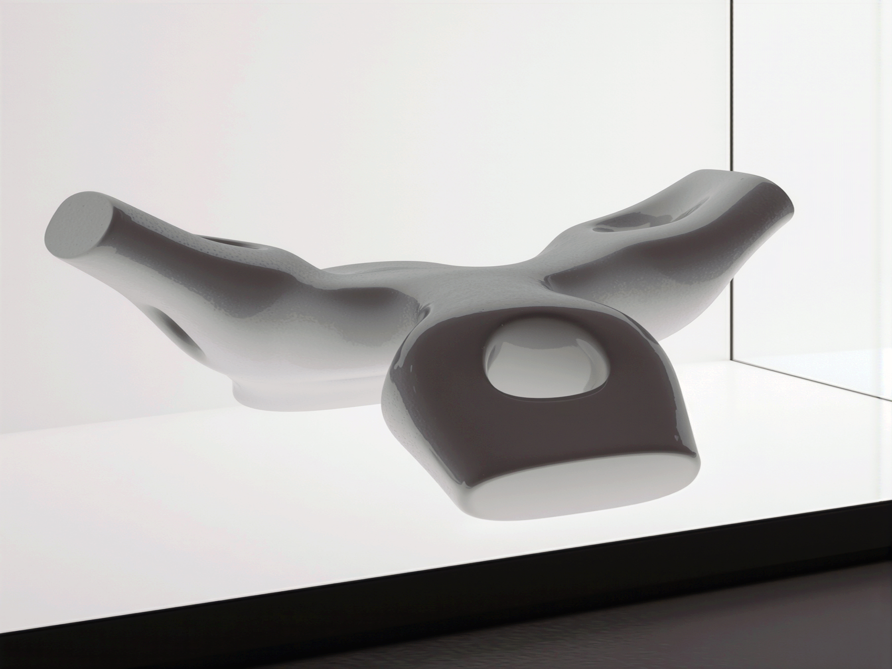 M_Scape sculpture detail showing the smooth biomorphic curves and reflective surface