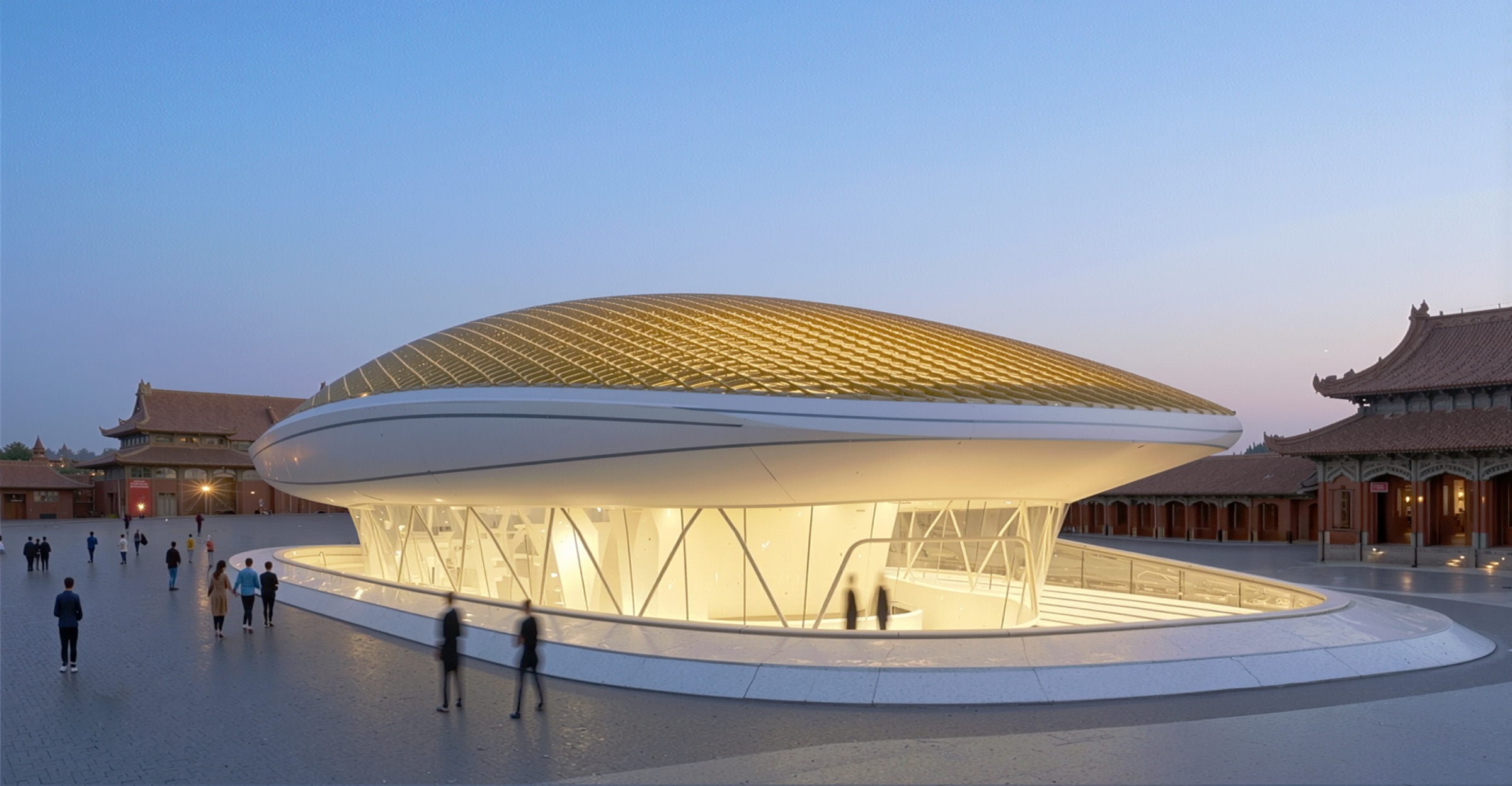 Early-evening view of the National Sports Hall pavilion with adjacent traditional architecture and approach plaza