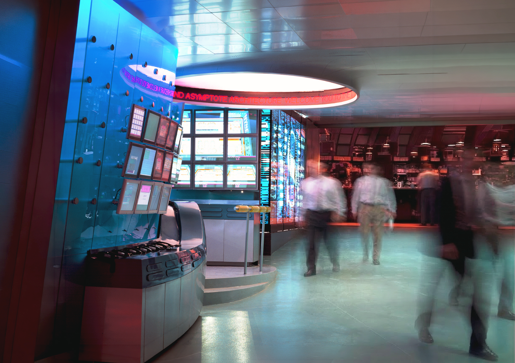 Command center information desk with multi-screen display wall, LED ticker, and traders in motion