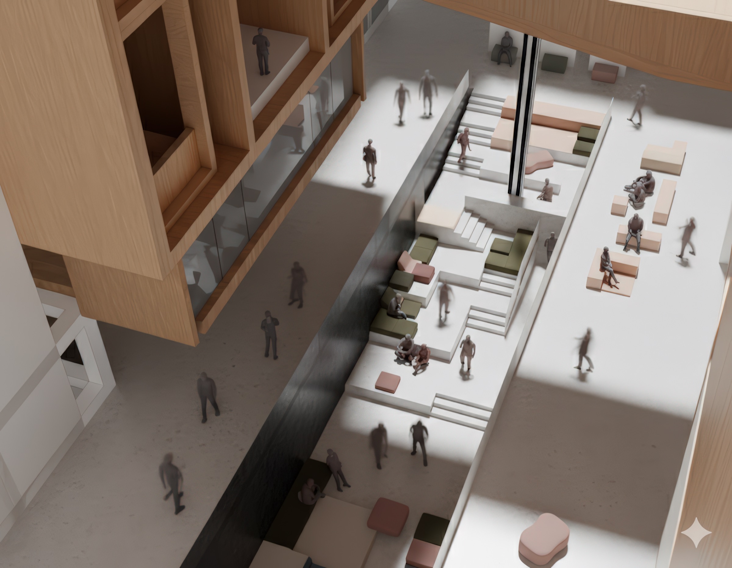 Aerial view down onto the stepped atrium lounge at ground level, showing timber furniture, coloured seating elements, a central reflecting strip, visitors gathered in conversation, and the glazed wall of the reading room visible above