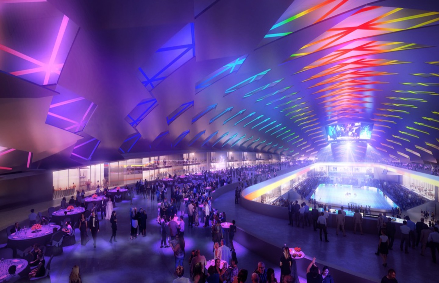 Interior concourse view with dramatic rainbow-colored LED lighting strips across the vaulted ceiling as visitors socialize on the upper level overlooking an ice rink below
