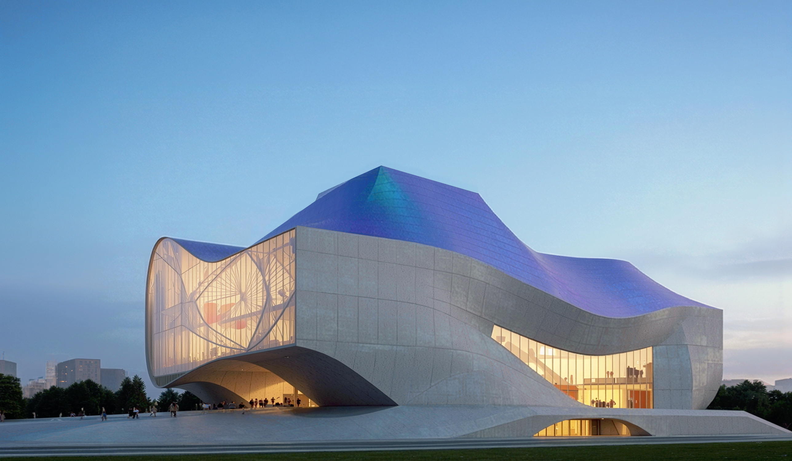 Exterior dusk view of the Sejong Center for Performing Arts with flowing facade and illuminated interior visible through glazing