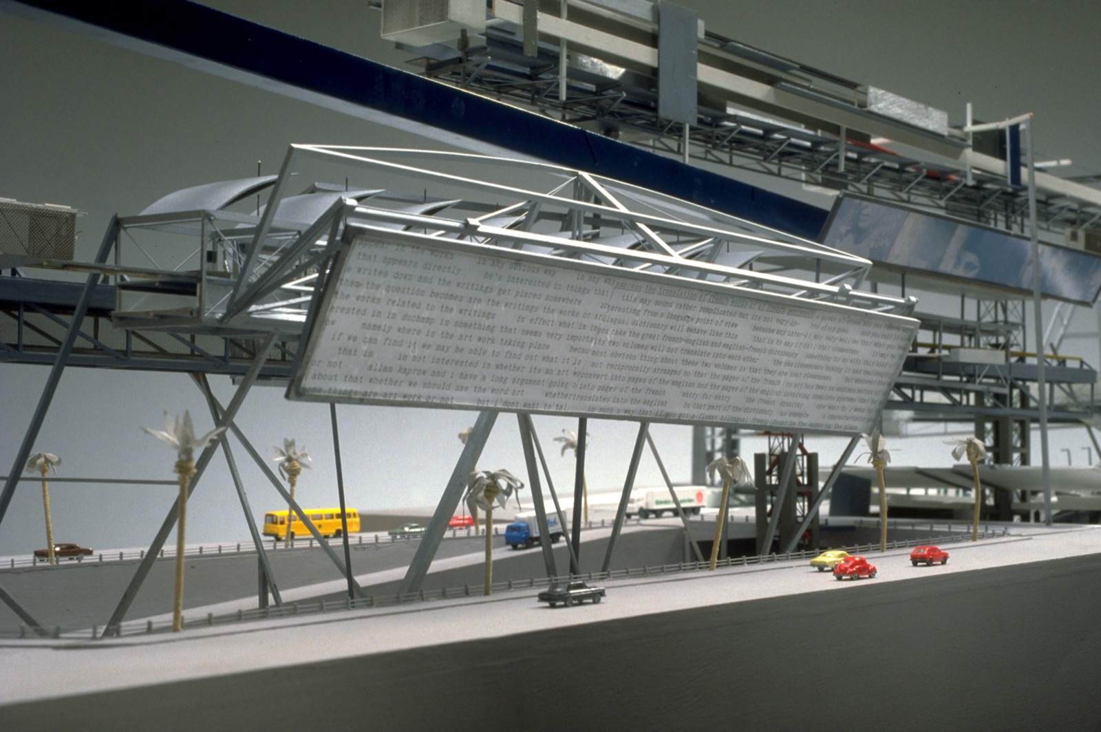 Steel Cloud model — close-up showing digital billboard screen and freeway below
