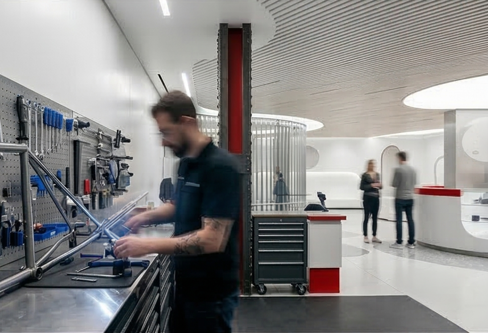Bike mechanic at work in the service workshop