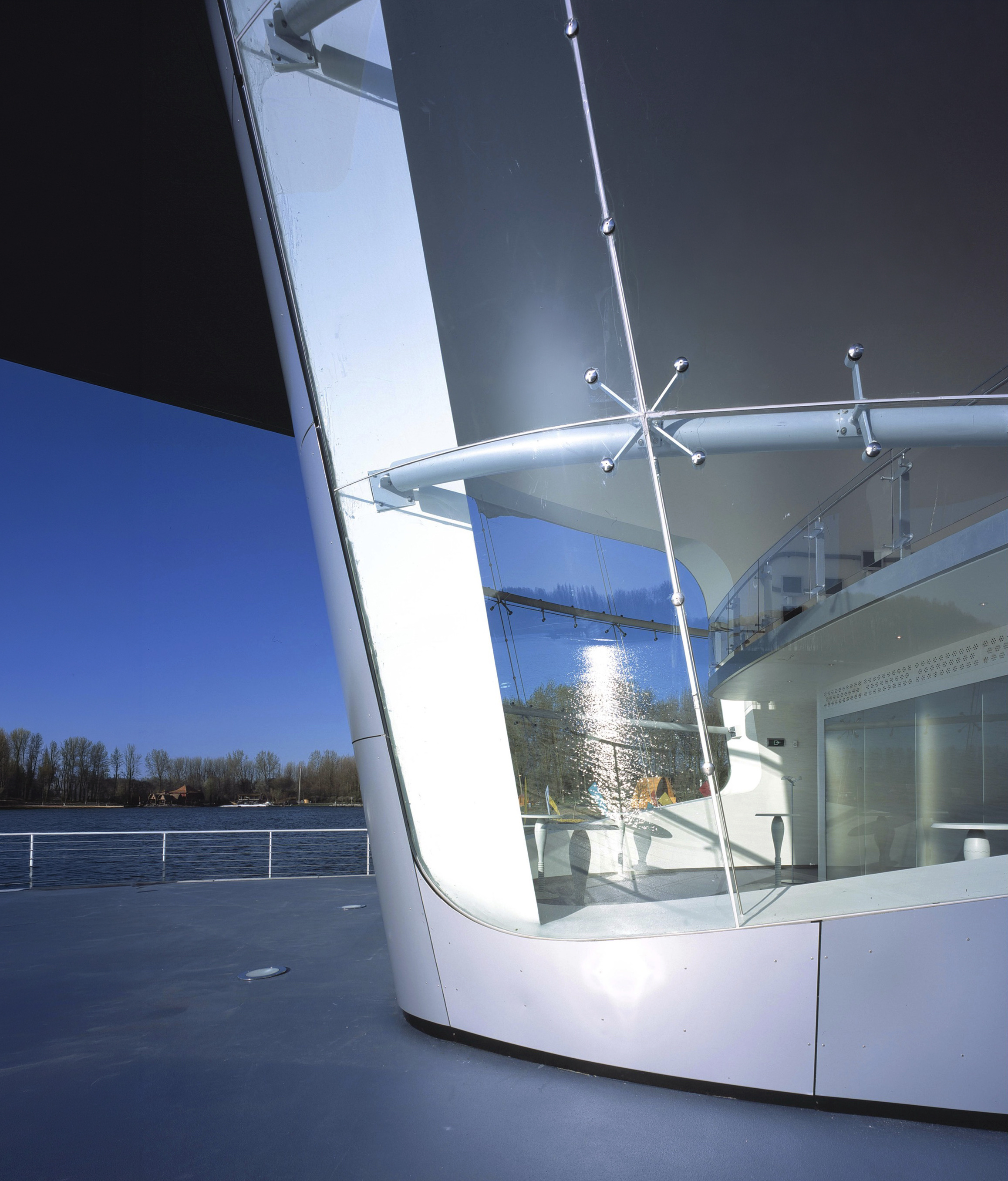 Aerial view of the HydraPier extending over the water with the Dutch landscape beyond