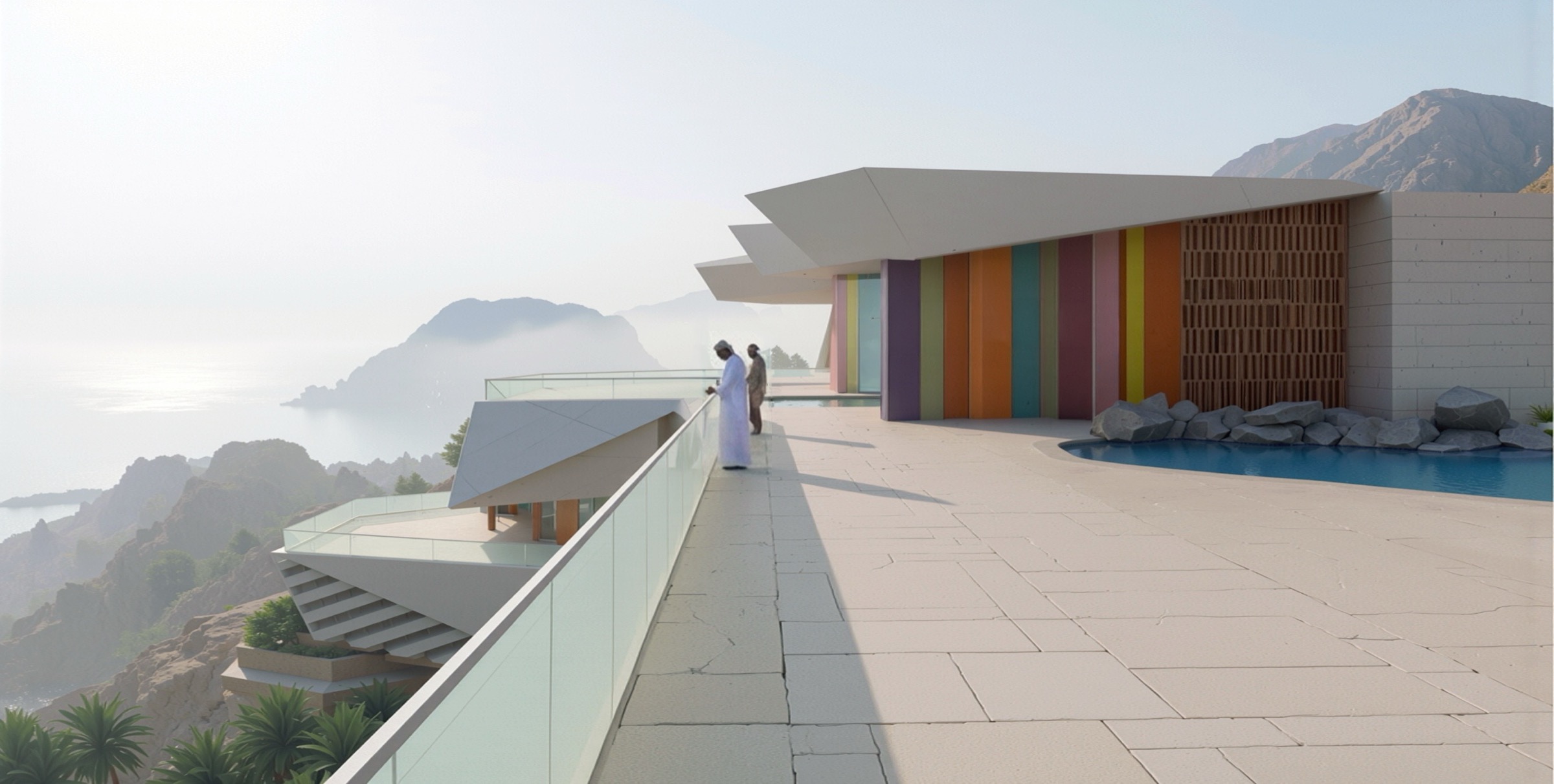 Terrace walkway with glass railing overlooking the Red Sea and distant mountains, colorful building facade on the right