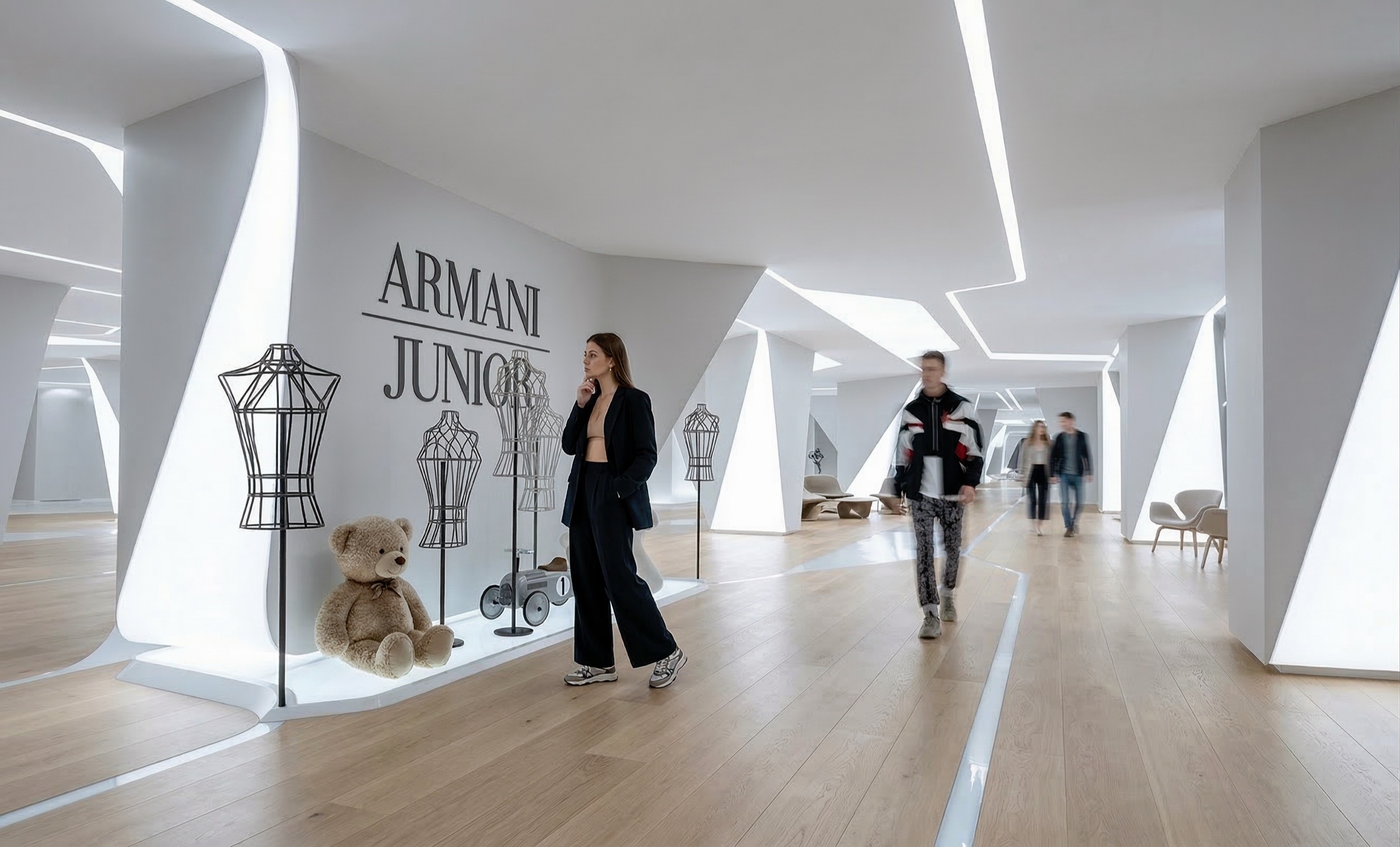Armani Junior department within the TSUM store — a corridor of faceted white angular walls with integrated LED lighting, dress forms and a teddy bear in a display alcove, oak flooring, and visitors walking through the sculptural passage
