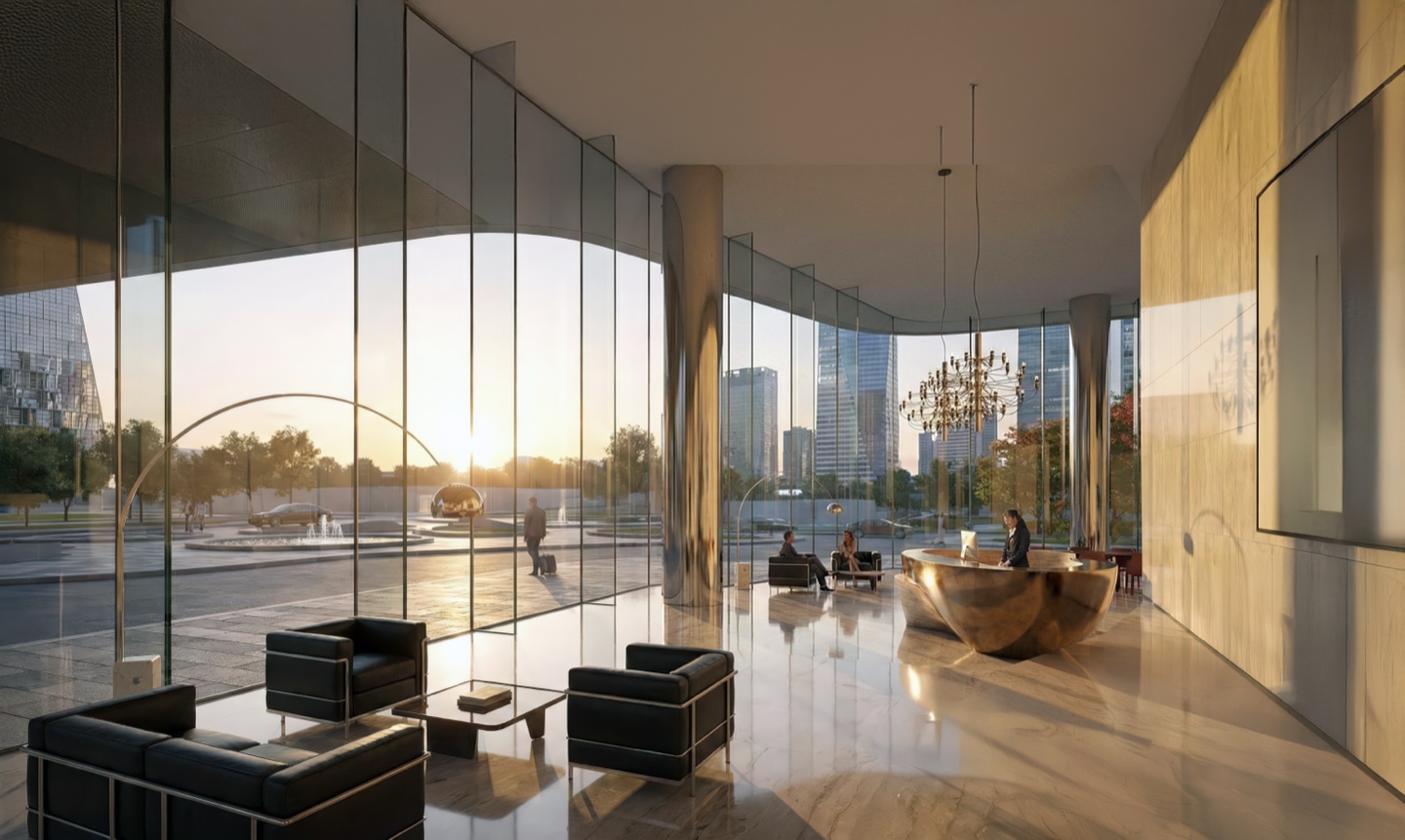 Tower lobby interior with floor-to-ceiling glazing and golden sunset light