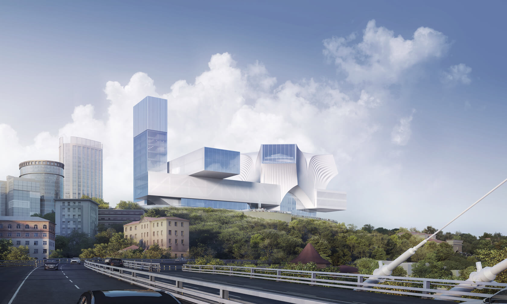 Aerial rendering of the Vladivostok Cultural Complex on a hillside above the city, showing interconnected museum volumes with angular white facades, glass towers, and the sculpted performing arts center with its pleated facade, set against the Vladivostok skyline and forested hillside