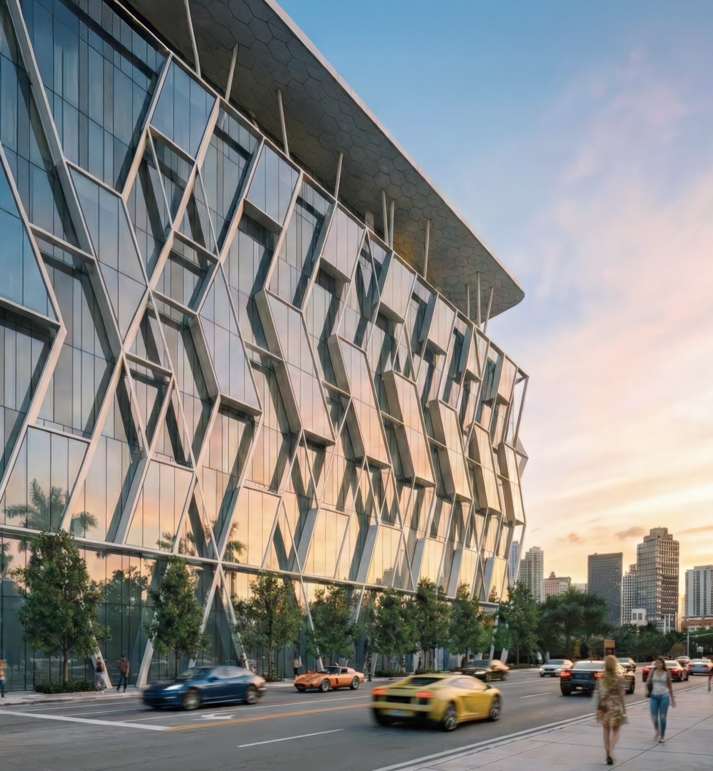 Dramatic corner perspective of the building at sunset showing the angular glass and steel facade with the Miami skyline in the background
