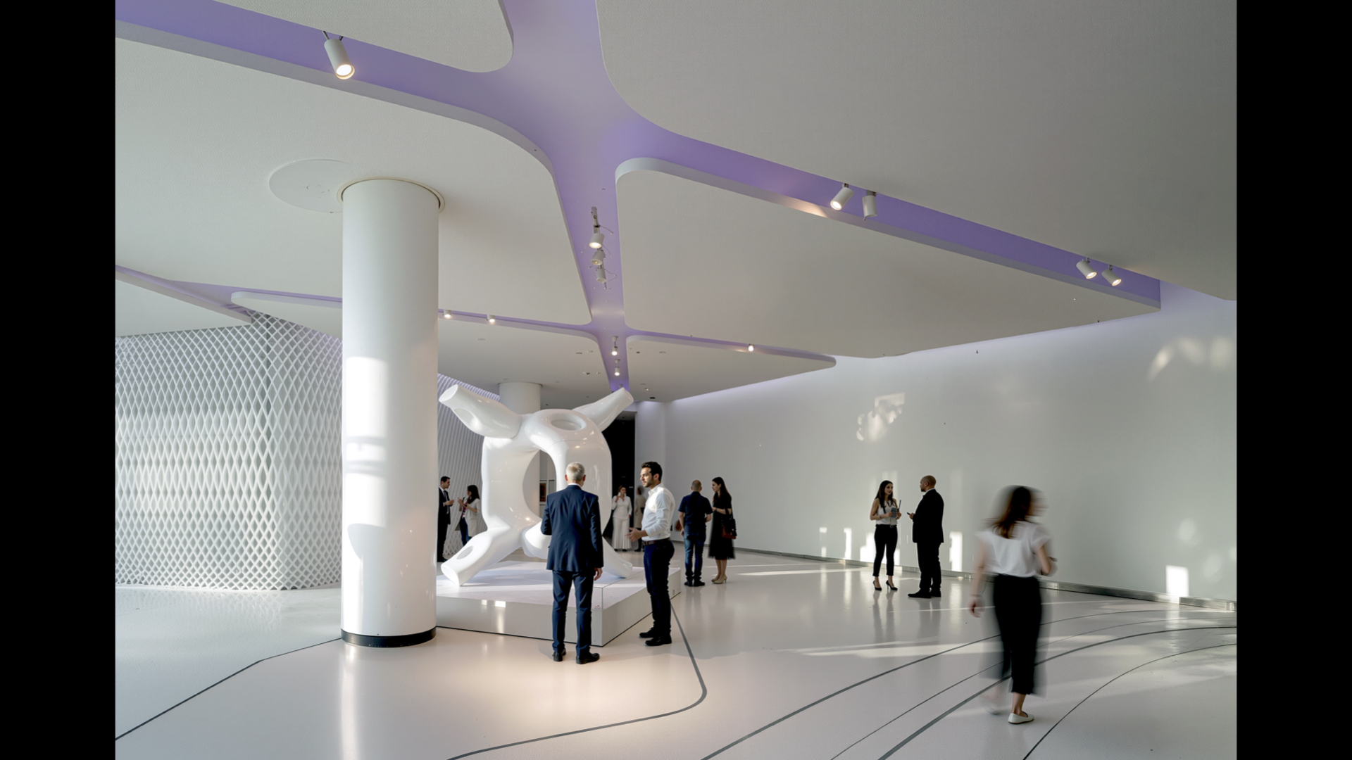 Yas Hotel interior lobby with sculptural elements, purple-lit ceiling details, and guests