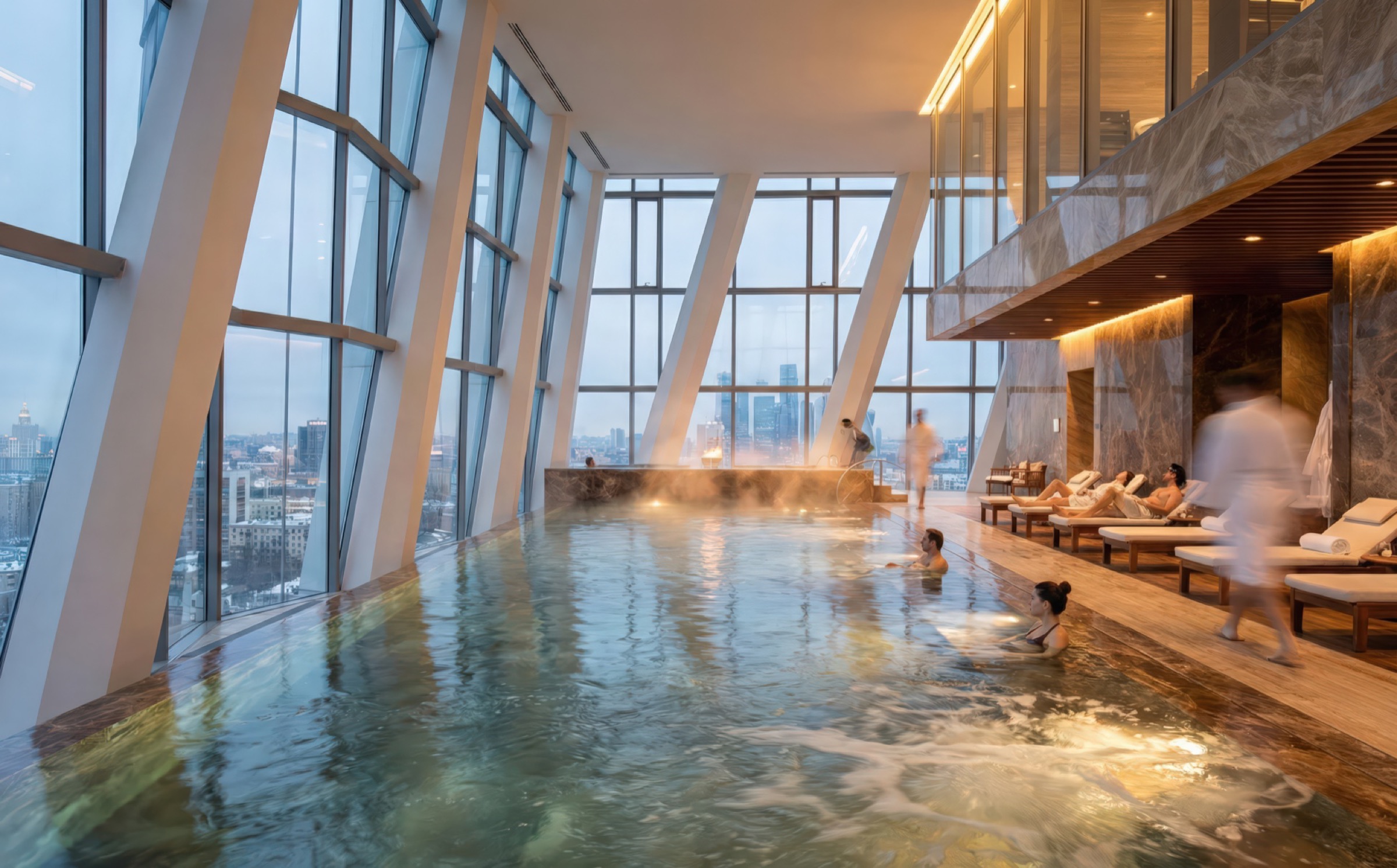 Luxury spa and infinity pool inside the Zil Gateway Tower with angular floor-to-ceiling windows framing panoramic views of the Moscow skyline