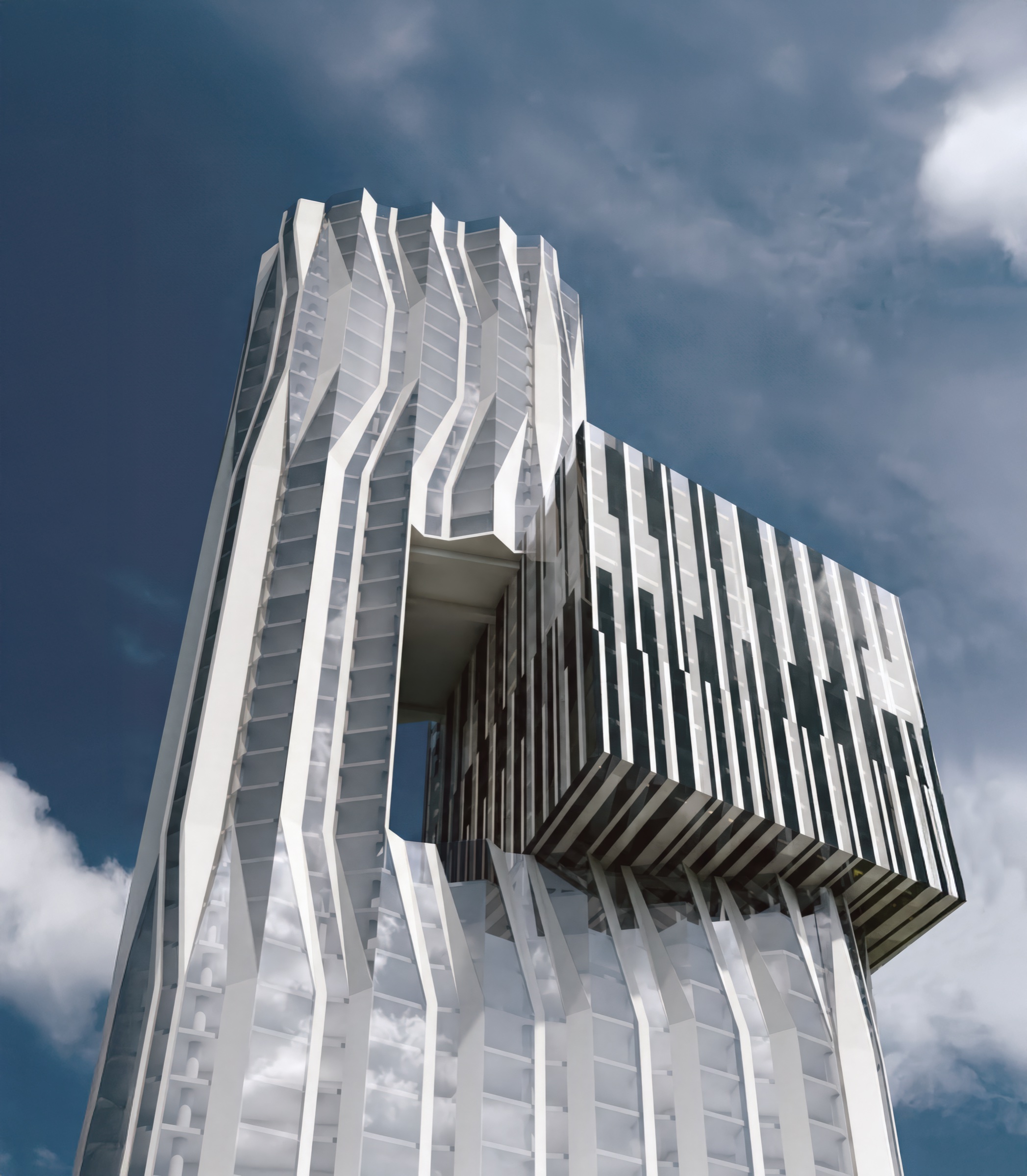 Portrait view of the ZIL Gateway Tower looking upward — undulating white vertical fins and cantilevered volumes create a dramatic sculptural silhouette against a cloudy sky